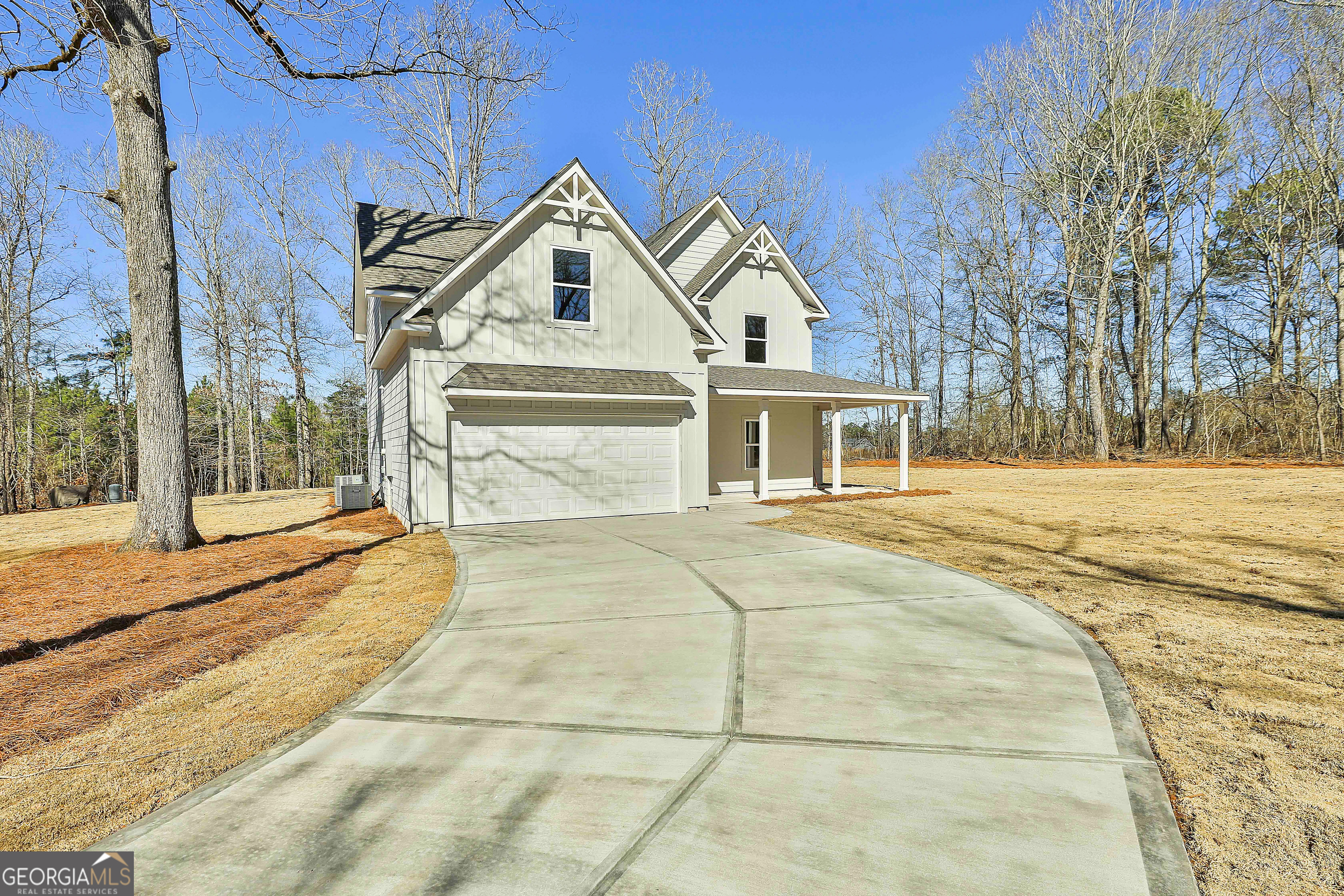 35 Oak Road Locust Grove, GA 30248 - Photo 2 of 36 a view of white house with a yard