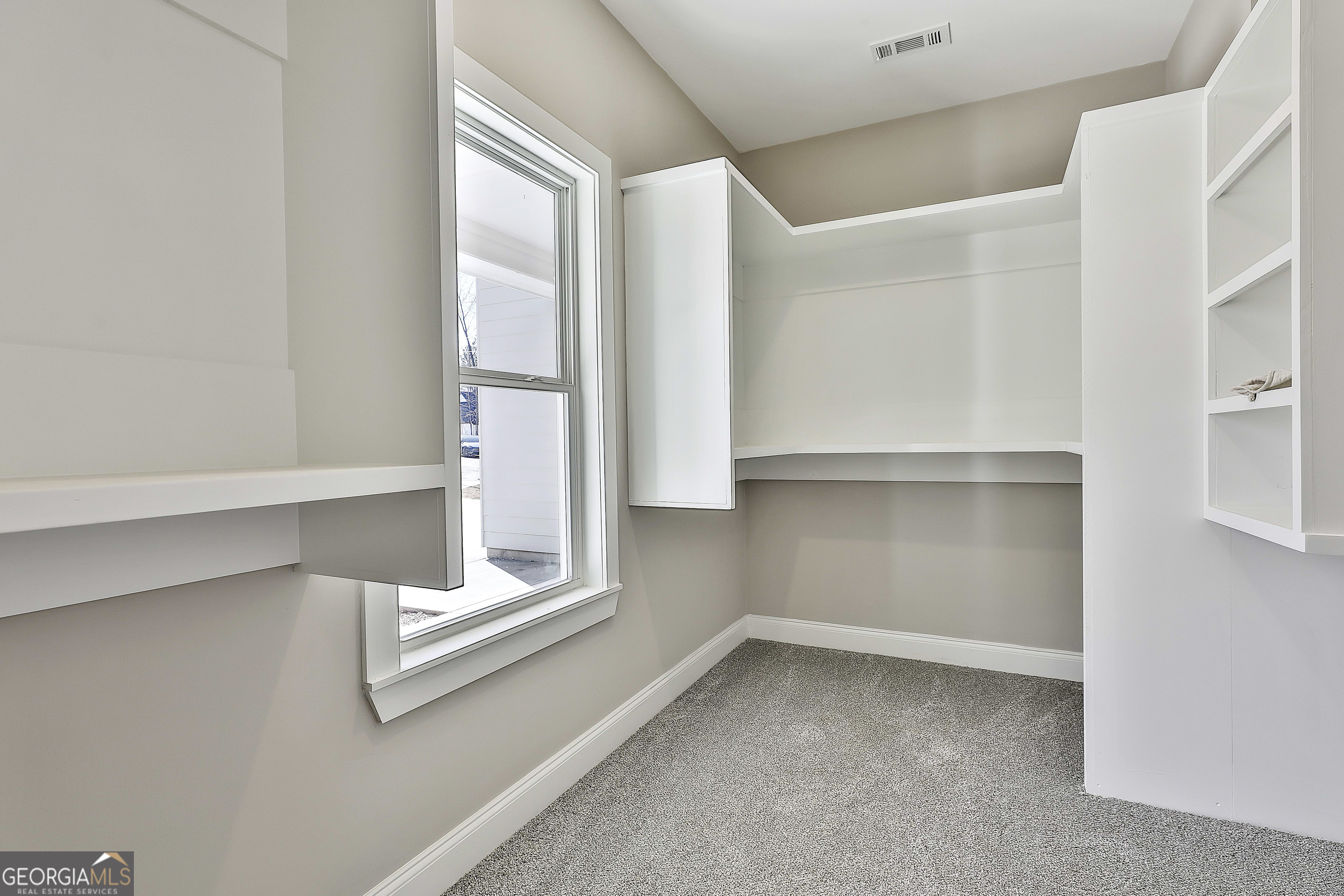 35 Oak Road Locust Grove, GA 30248 - Photo 23 of 36 a view of an empty room with cabinet