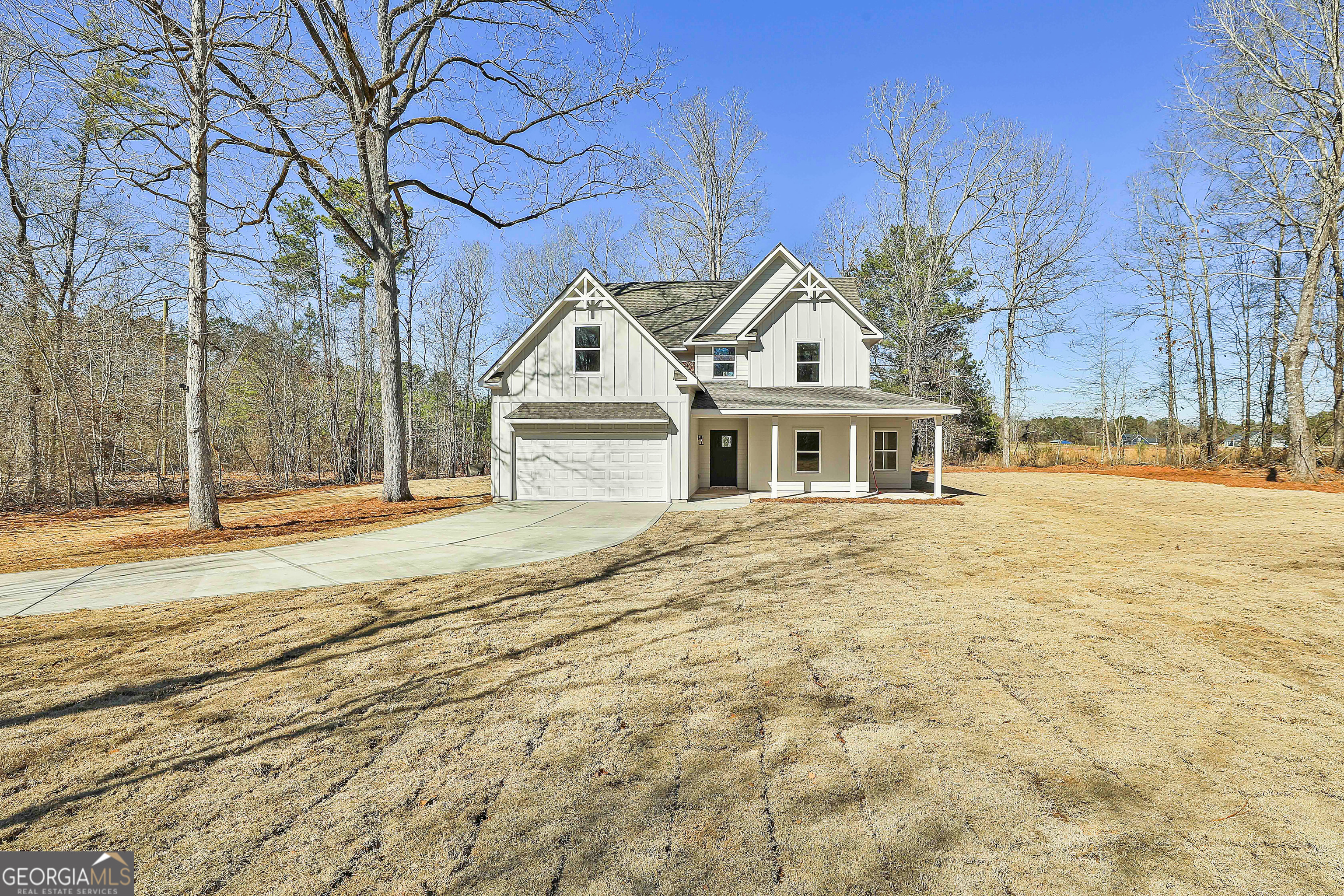 35 Oak Road Locust Grove, GA 30248 - Photo 3 of 36 a front view of a house with a yard