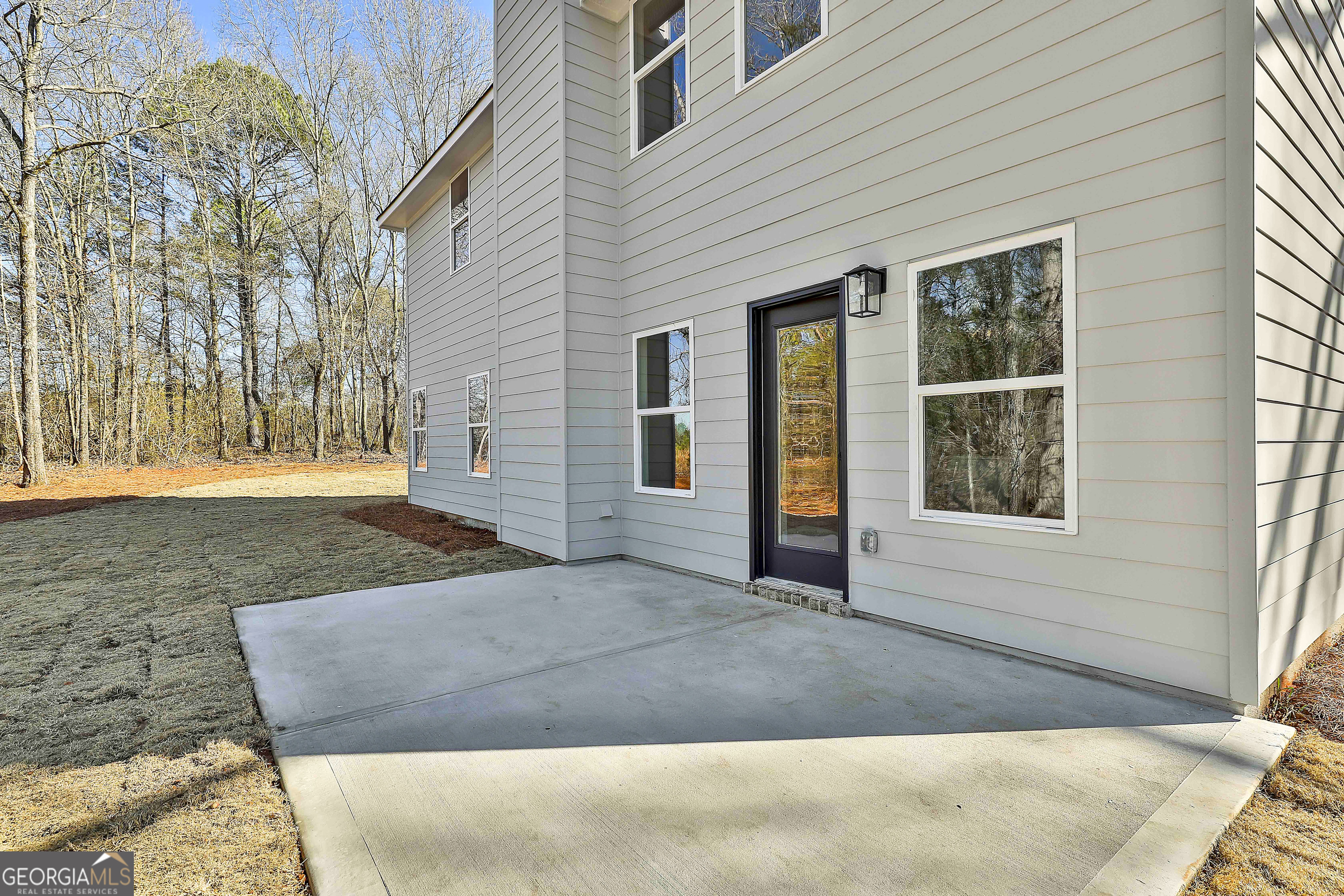 35 Oak Road Locust Grove, GA 30248 - Photo 32 of 36 a view of outdoor space and front view of a house