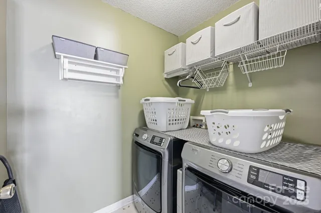 a kitchen with a stove and a microwave