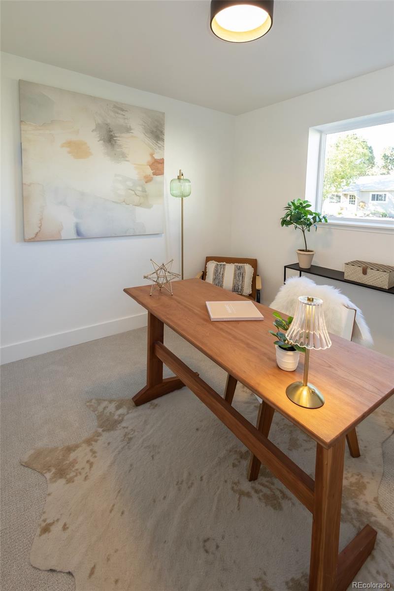 5711 West 92nd Avenue, Unit 20 Westminster, CO 80031 - Photo 21 of 26 a reading room with furniture and window