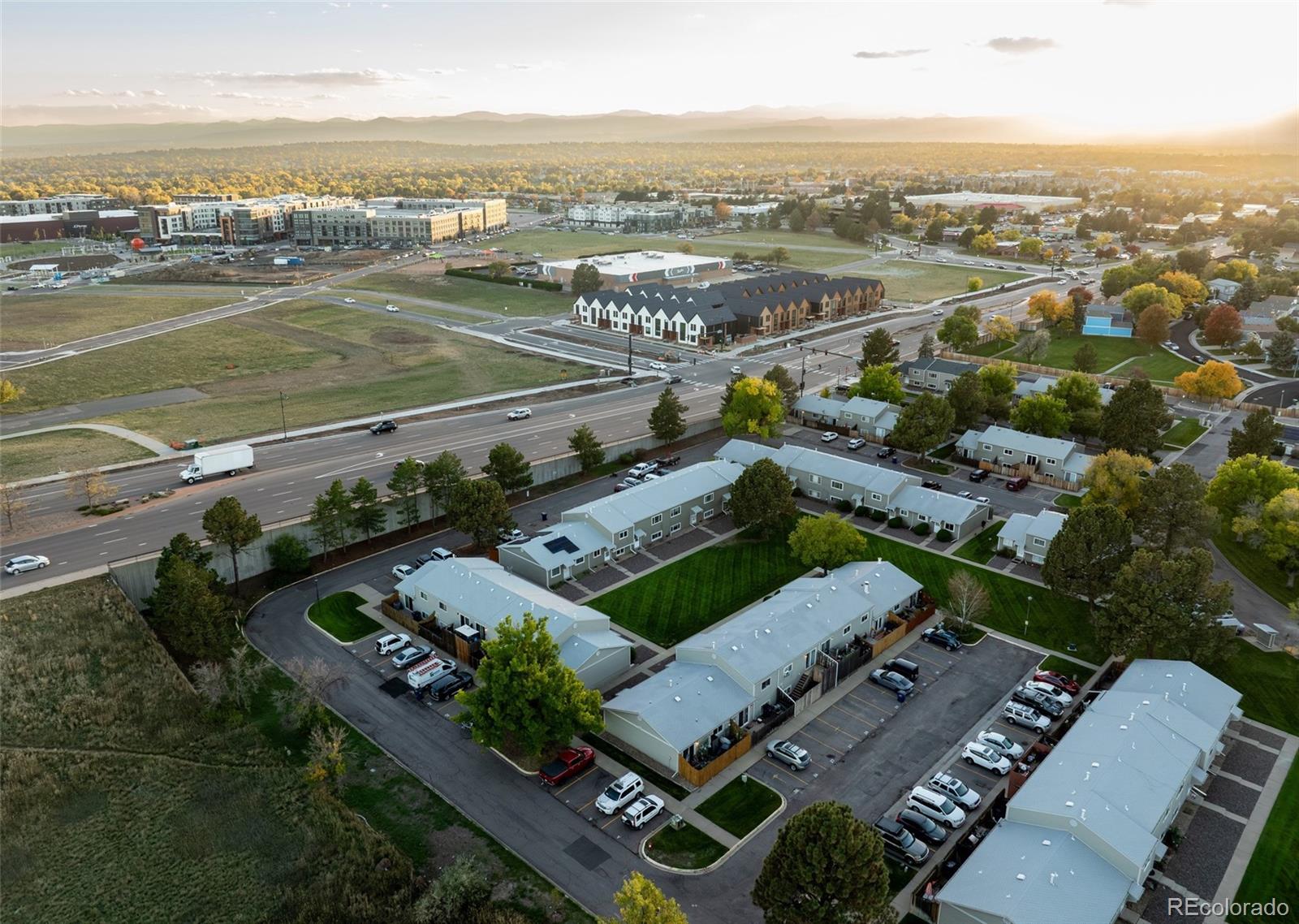 5711 West 92nd Avenue, Unit 20 Westminster, CO 80031 - Photo 25 of 26 an aerial view of a city with lots of residential buildings