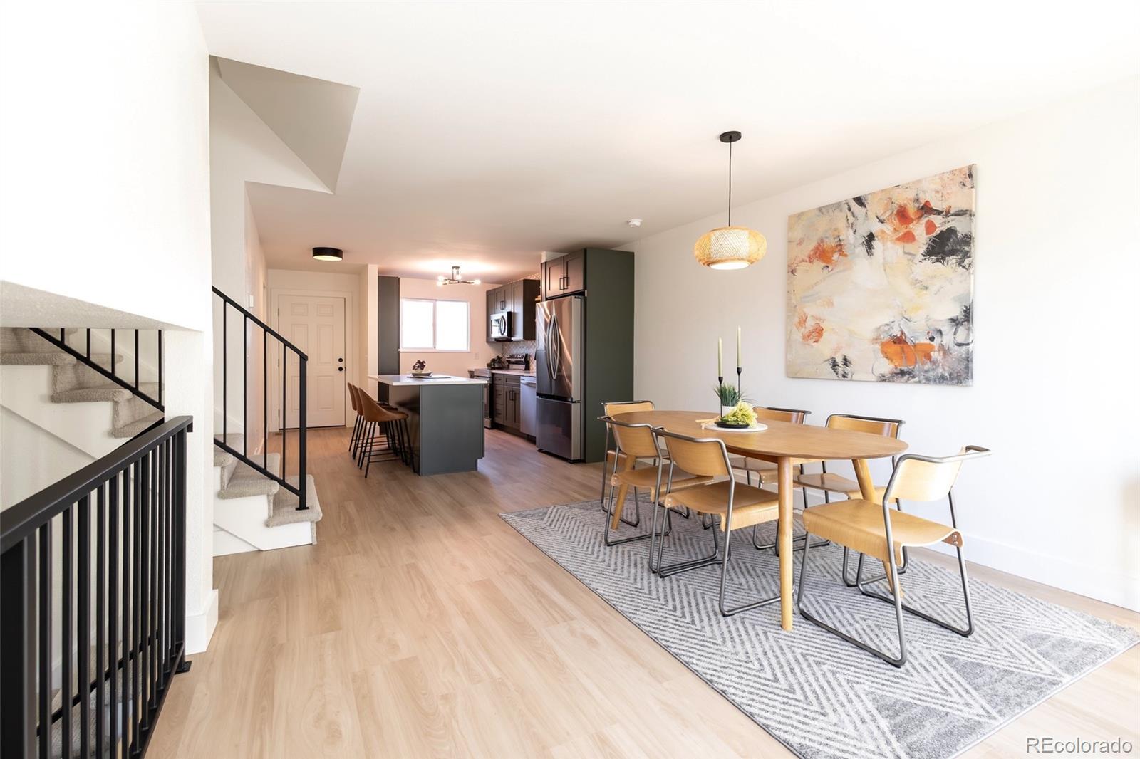 5711 West 92nd Avenue, Unit 20 Westminster, CO 80031 - Photo 7 of 26 a workspace with wooden floor