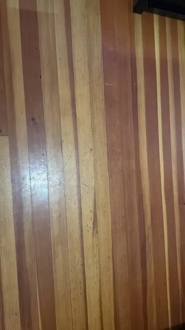 a kitchen with a sink a stove and cabinets