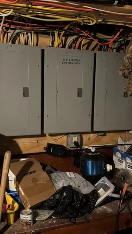 a bed sitting in a kitchen next to a window