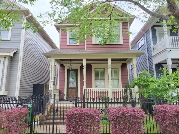 a front view of a house with a porch