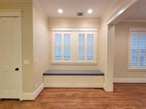 a view of entryway with wooden floor