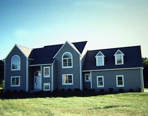 L5 Fox Ridge Drive New Milford, CT 06776 - Photo 1 of 1 a front view of a house with garden