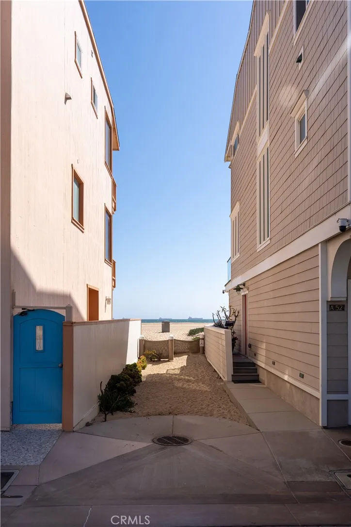 53 Surfside Avenue Surfside, CA 90743 - Photo 7 of 9 A private beach entrance just steps from your front door.