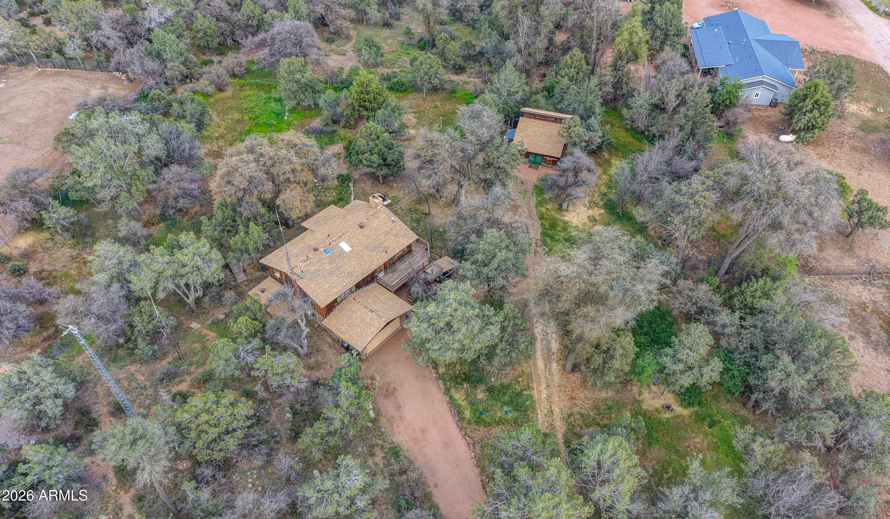 8135 West Gibson Ranch Road Payson, AZ 85541 - Photo 33 of 43 an aerial view of a house with a yard and tree s