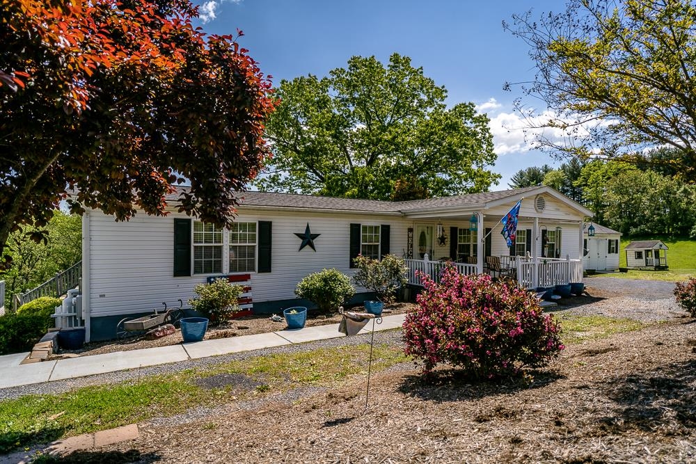 1271 Union Church Road Churchville, VA 24421 - Photo 1 of 46 a front view of a house with garden