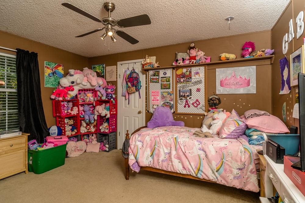 1271 Union Church Road Churchville, VA 24421 - Photo 13 of 46 a bedroom with bed and a chandelier