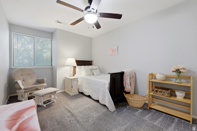 1175 Canyon Road, Unit 86 Ogden, UT 84404 - Photo 18 of 29 Carpeted room featuring a ceiling fan with integrated lighting, a window with blinds, and light-toned walls