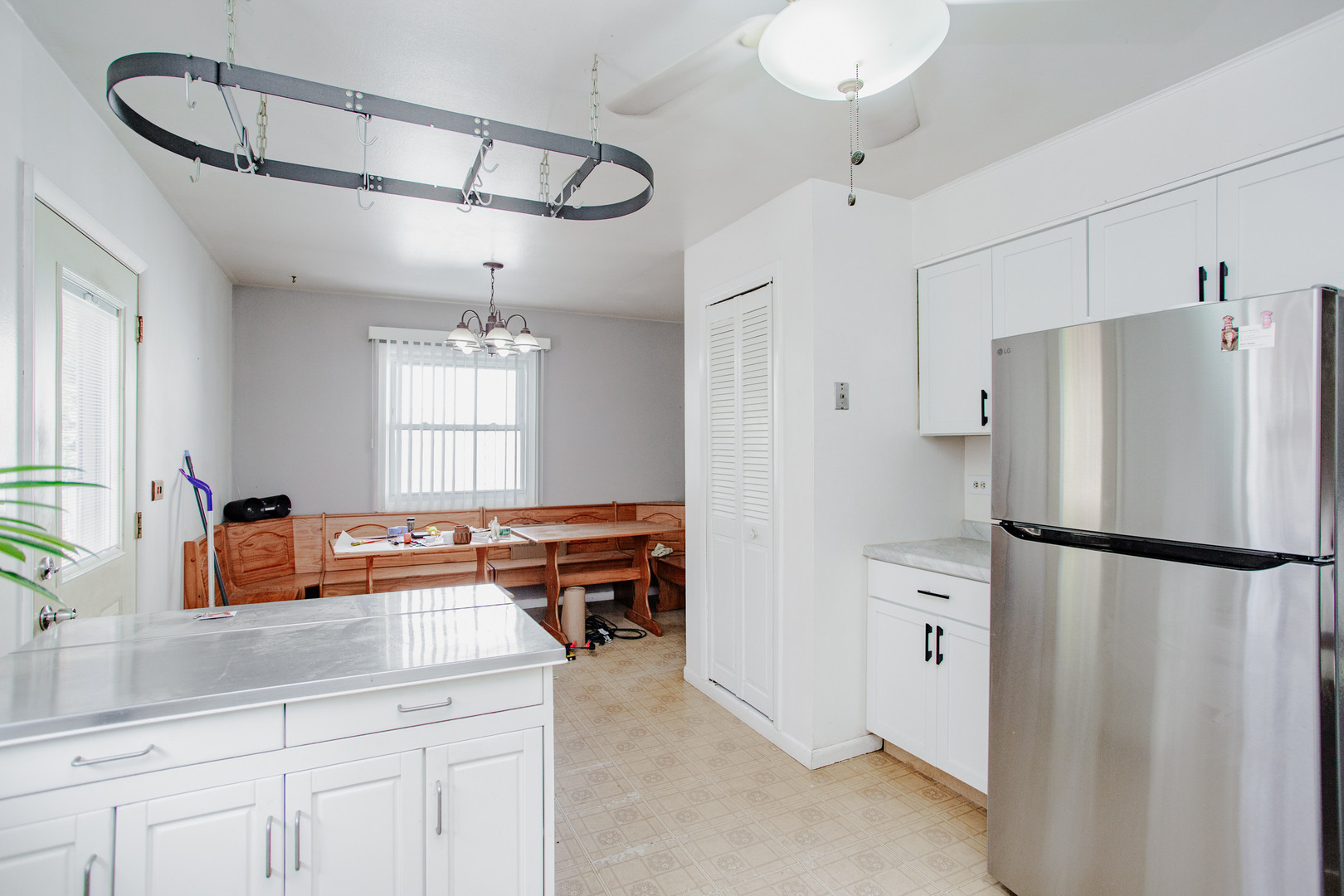 106 Woodcrest Circle Streamwood, IL 60107 - Photo 11 of 29 a kitchen with stainless steel appliances a refrigerator and a sink