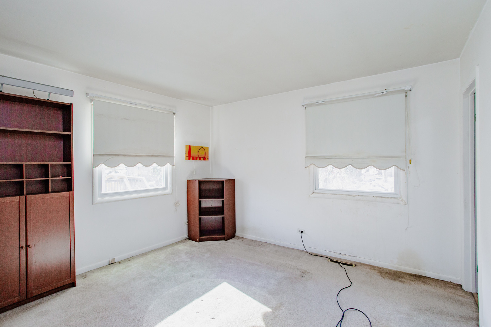 106 Woodcrest Circle Streamwood, IL 60107 - Photo 12 of 29 an empty room with windows