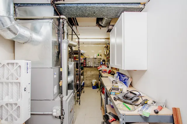 a view of storage and utility room with racks on the wall