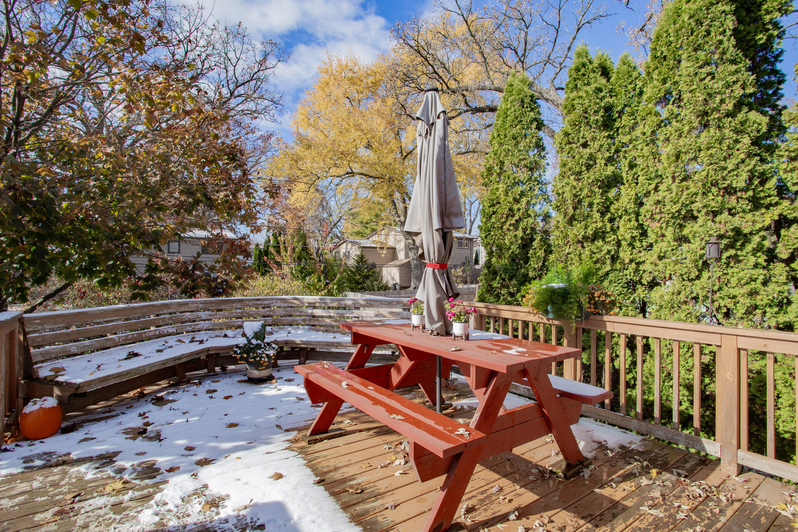 106 Woodcrest Circle Streamwood, IL 60107 - Photo 23 of 29 a view of a patio with a table and chairs with wooden fence