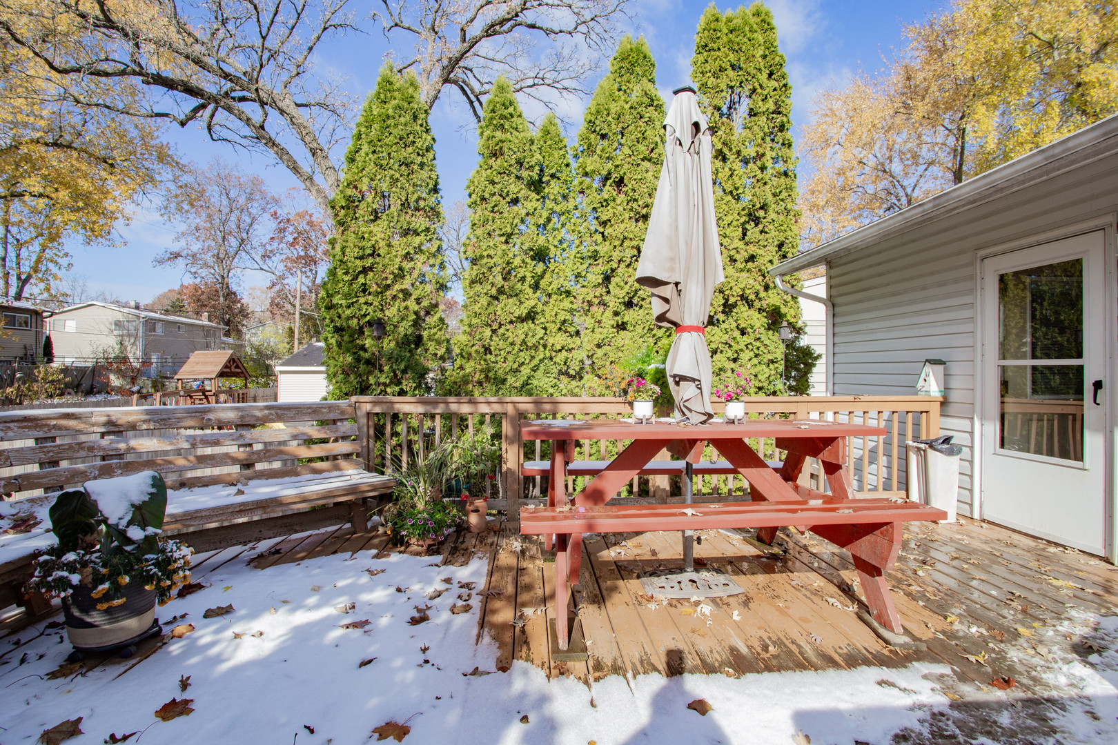 106 Woodcrest Circle Streamwood, IL 60107 - Photo 24 of 29 a view of a chairs and tables in the back yard of the house
