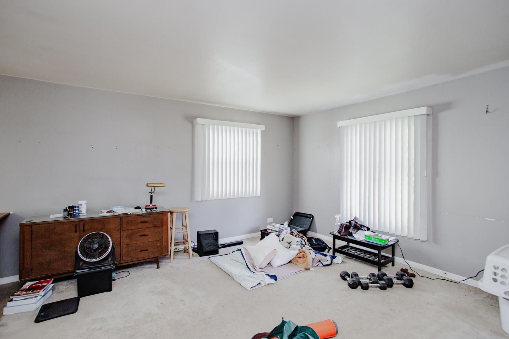 106 Woodcrest Circle Streamwood, IL 60107 - Photo 4 of 29 a room with a car parked beside it