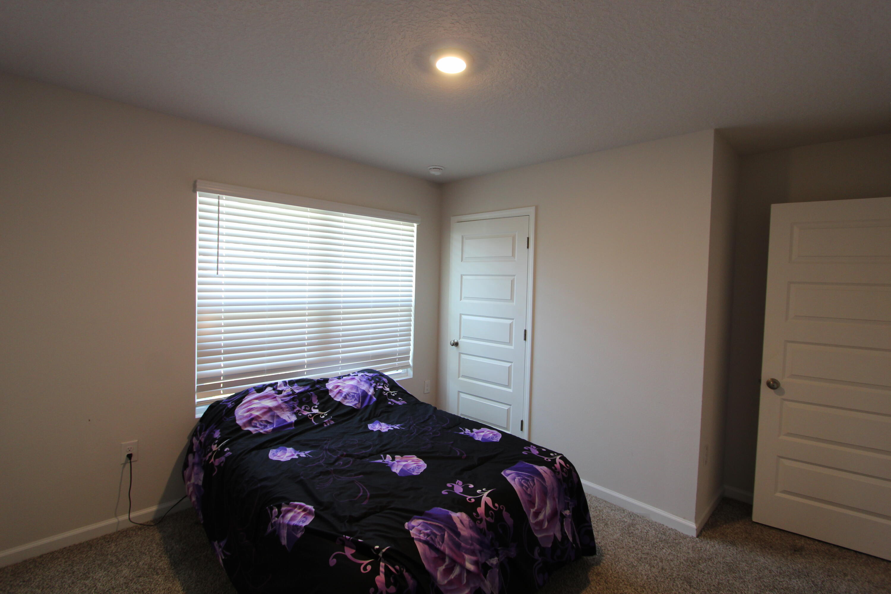 5372 Wyndell Circle Crestview, FL 32539 - Photo 18 of 36 a bedroom with a bed and a window