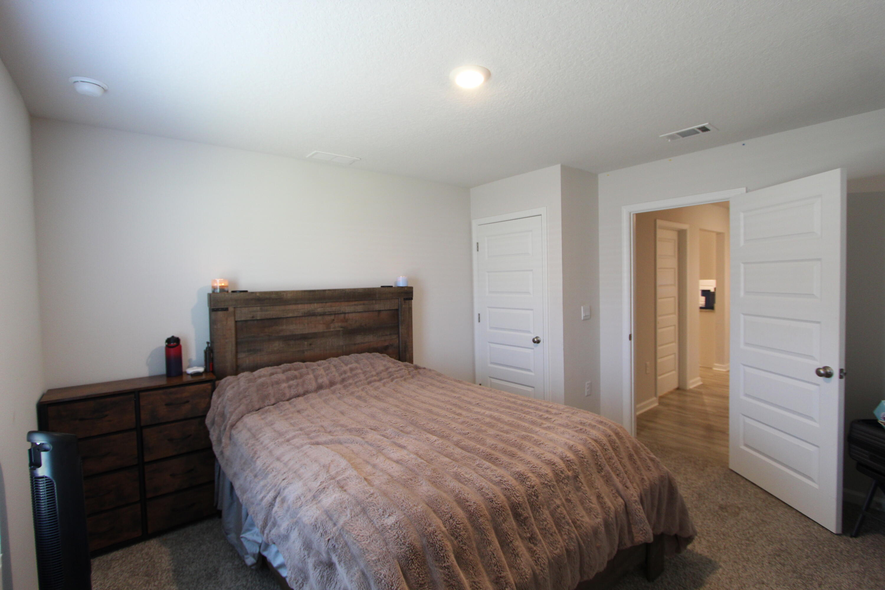 5372 Wyndell Circle Crestview, FL 32539 - Photo 22 of 36 a bedroom with a bed and a closet