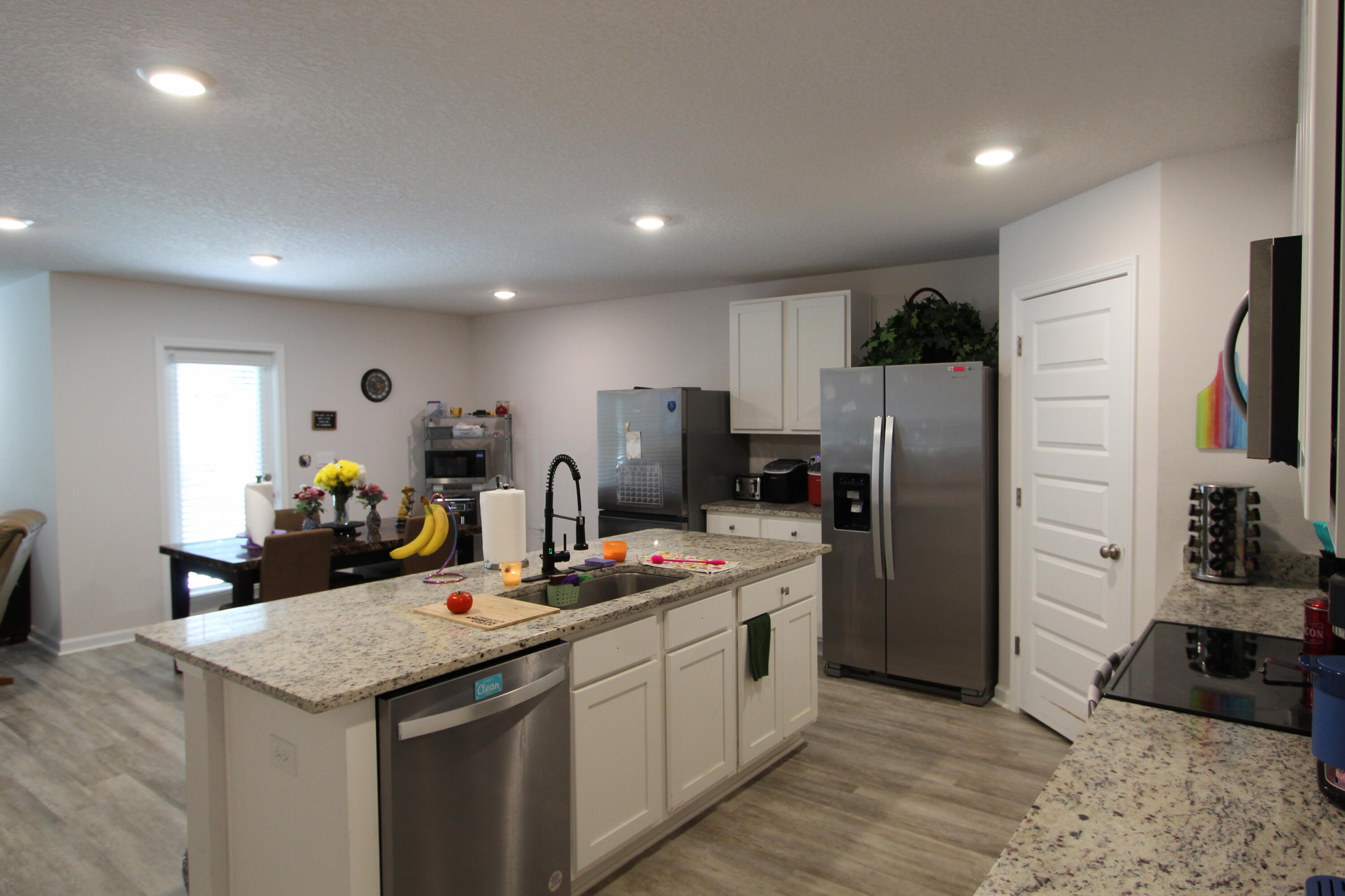 5372 Wyndell Circle Crestview, FL 32539 - Photo 24 of 36 a kitchen that has a lot of cabinets and refrigerator in it