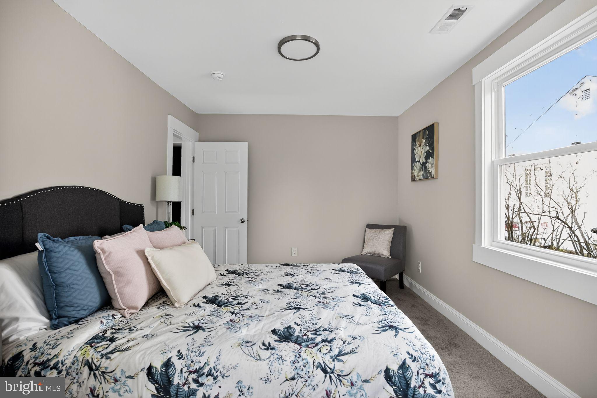 109 State Avenue Lindenwold, NJ 08021 - Photo 16 of 30 a bedroom with a bed and a window