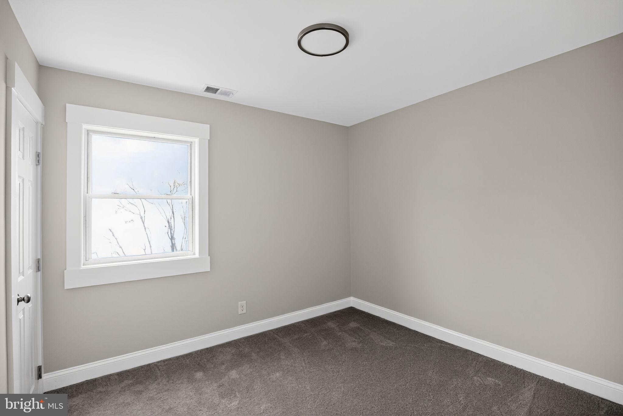 109 State Avenue Lindenwold, NJ 08021 - Photo 20 of 30 an empty room with a window