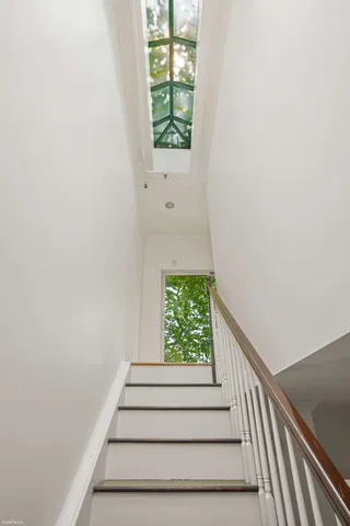 a bathroom with a sink a toilet and bathtub