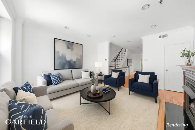 a front view of a multi story building with yard