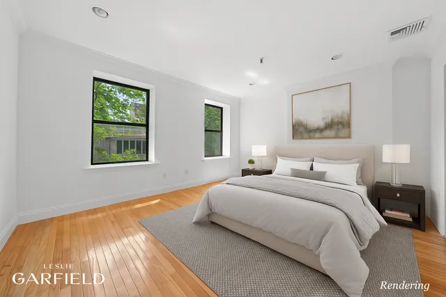 a couple of chairs sitting in patio with a table and chairs