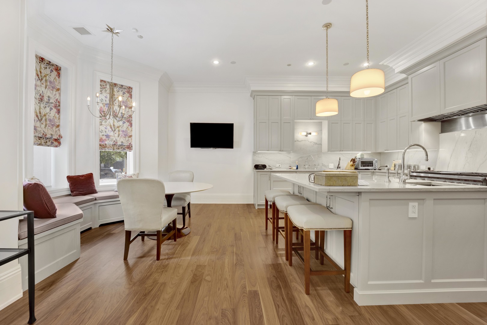 103 West Chestnut Street Chicago, IL 60610 - Photo 11 of 51 a large kitchen with a table and chairs