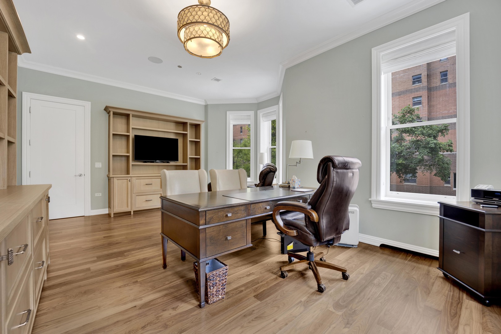 103 West Chestnut Street Chicago, IL 60610 - Photo 20 of 51 a view of a workspace with furniture and a window