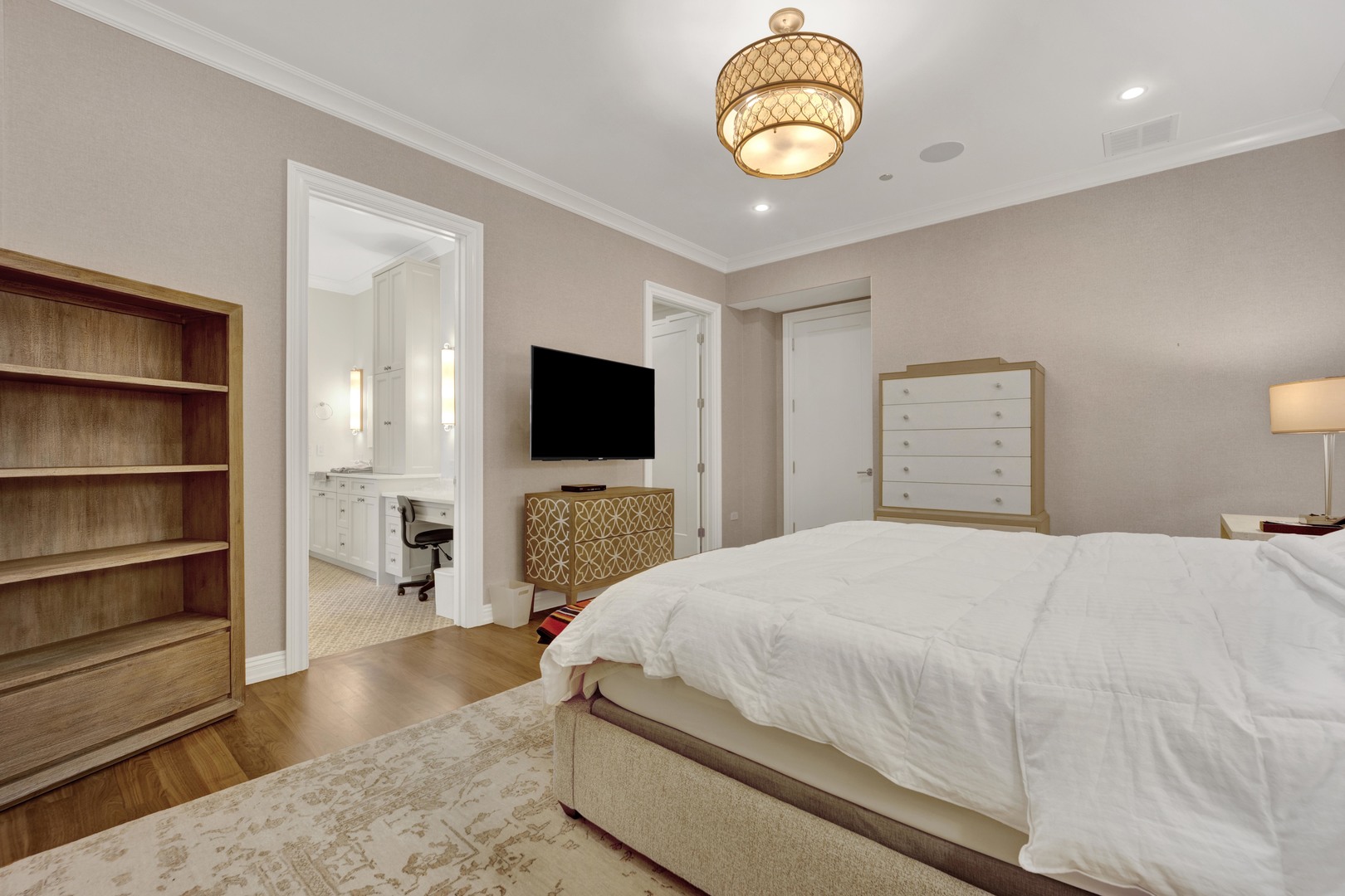 103 West Chestnut Street Chicago, IL 60610 - Photo 29 of 51 a bedroom with a bed and a flat screen tv
