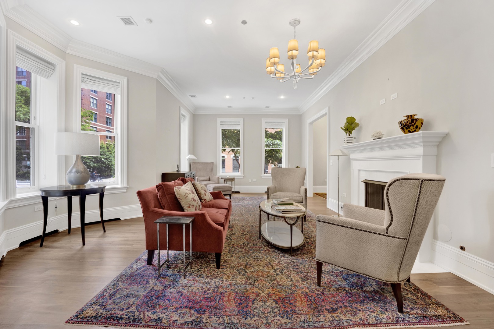 103 West Chestnut Street Chicago, IL 60610 - Photo 3 of 51 a living room with furniture a dining table and a fireplace