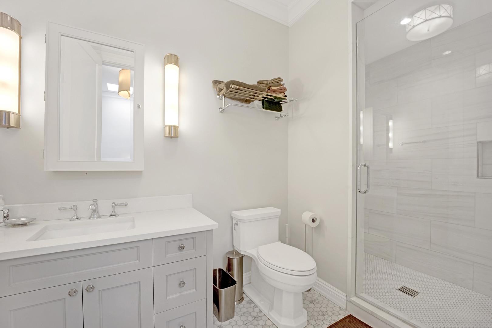 103 West Chestnut Street Chicago, IL 60610 - Photo 31 of 51 a bathroom with a sink toilet and shower