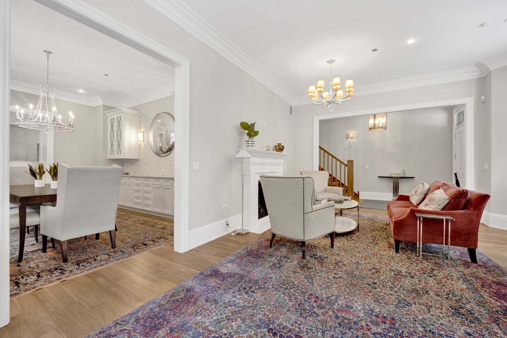 103 West Chestnut Street Chicago, IL 60610 - Photo 5 of 51 a living room with furniture and a chandelier