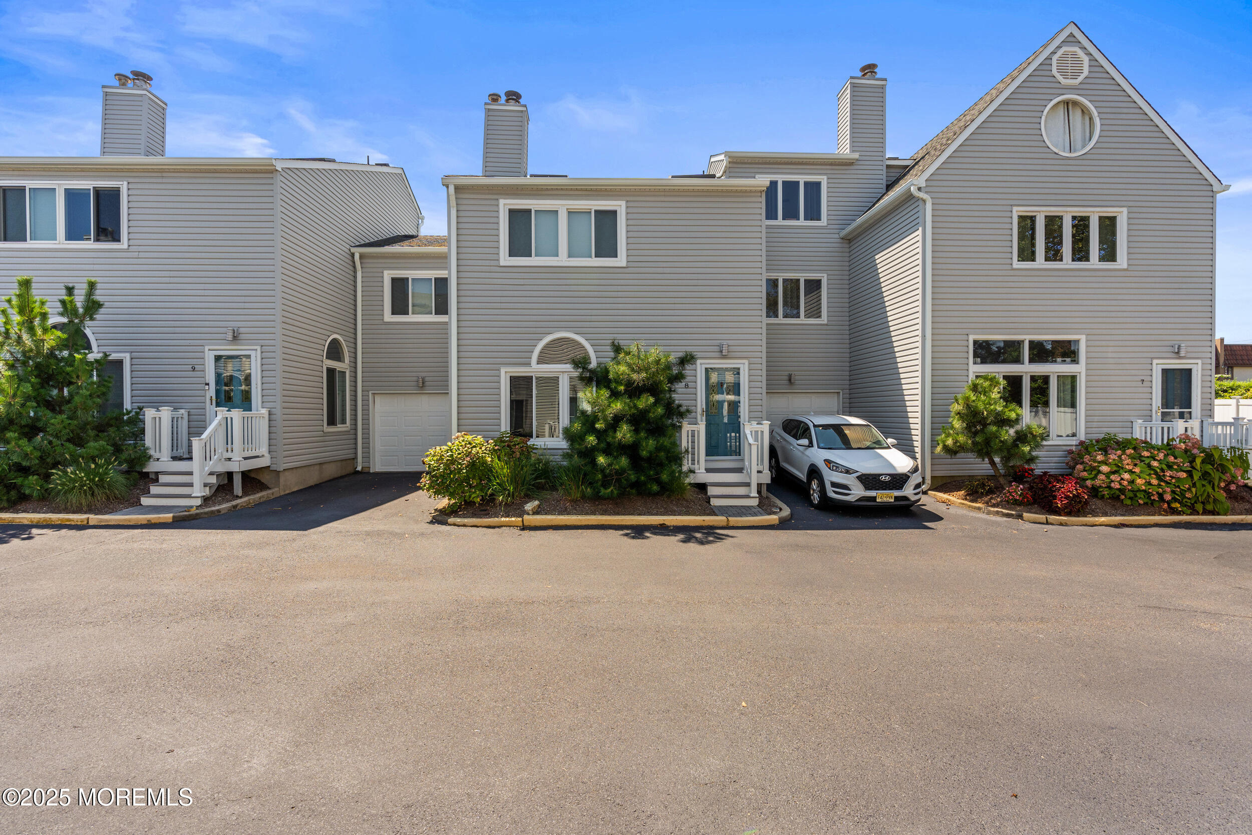 450 Ocean Boulevard, Unit 8 Long Branch, NJ 07740 - Photo 1 of 33 a view of a house with a street