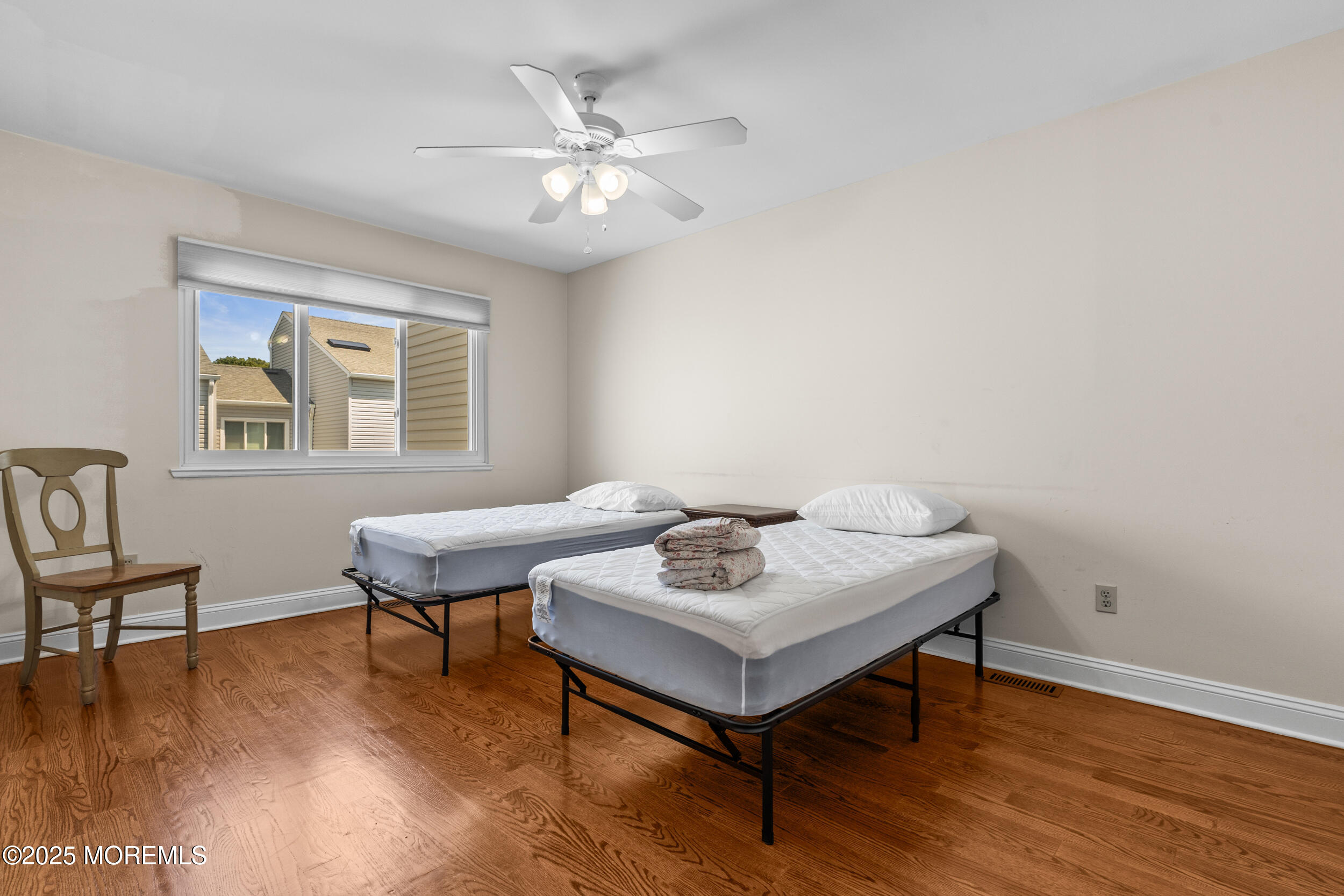 450 Ocean Boulevard, Unit 8 Long Branch, NJ 07740 - Photo 14 of 33 a view of a workspace with wooden floor and a window
