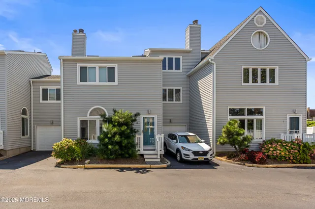 a car parked in front of a house