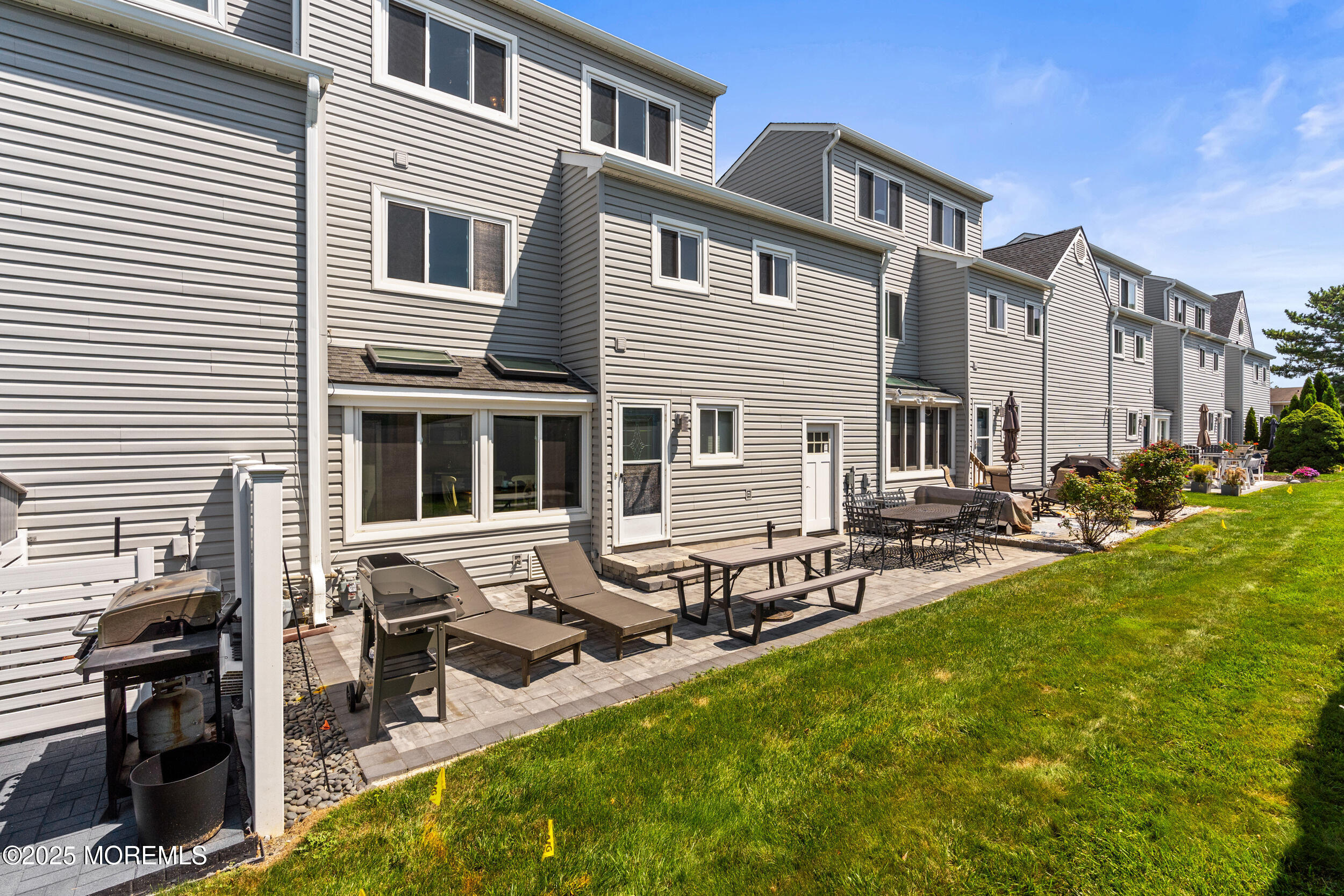 450 Ocean Boulevard, Unit 8 Long Branch, NJ 07740 - Photo 29 of 33 a view of a house with sitting area and furniture