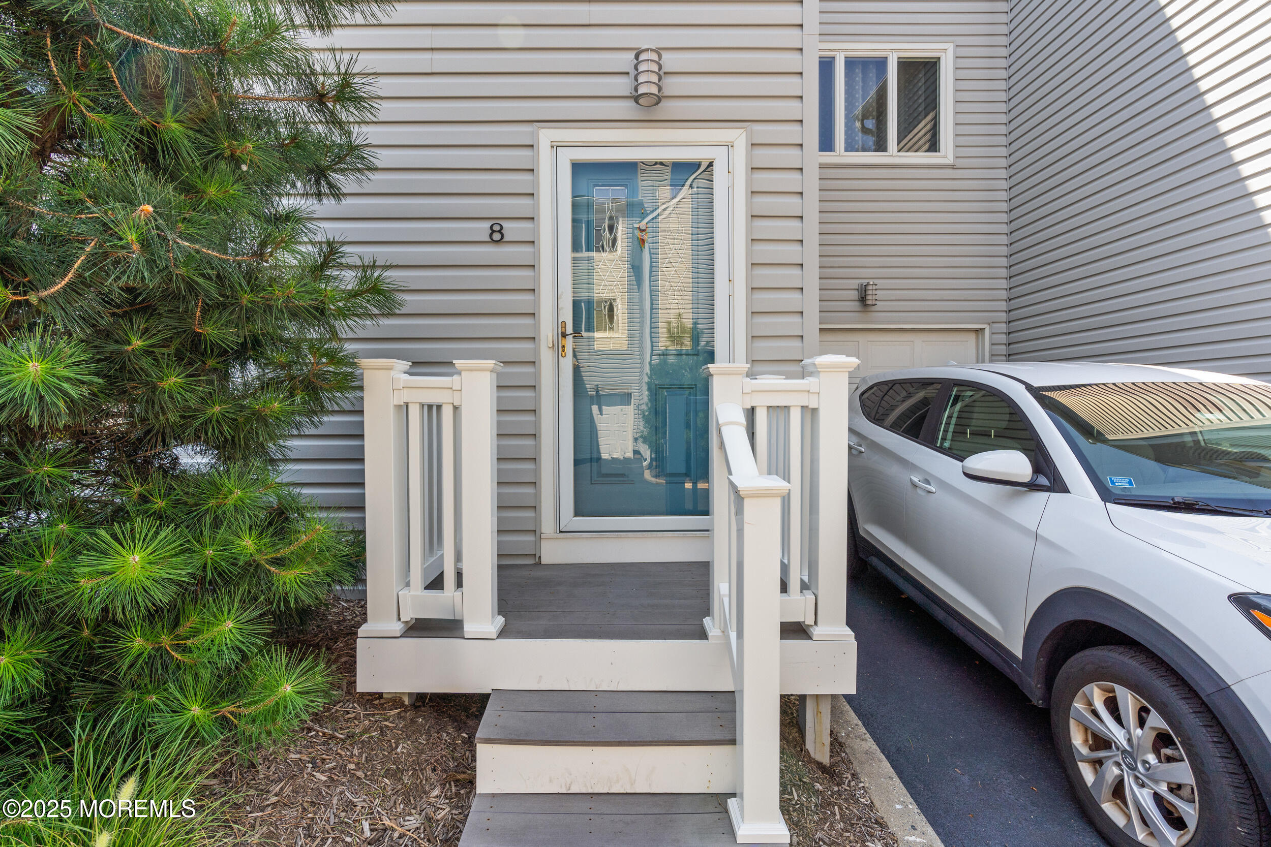 450 Ocean Boulevard, Unit 8 Long Branch, NJ 07740 - Photo 3 of 33 a view of a door of a house with a door