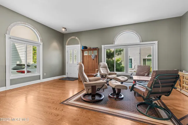 a view of a livingroom with furniture window and outside view