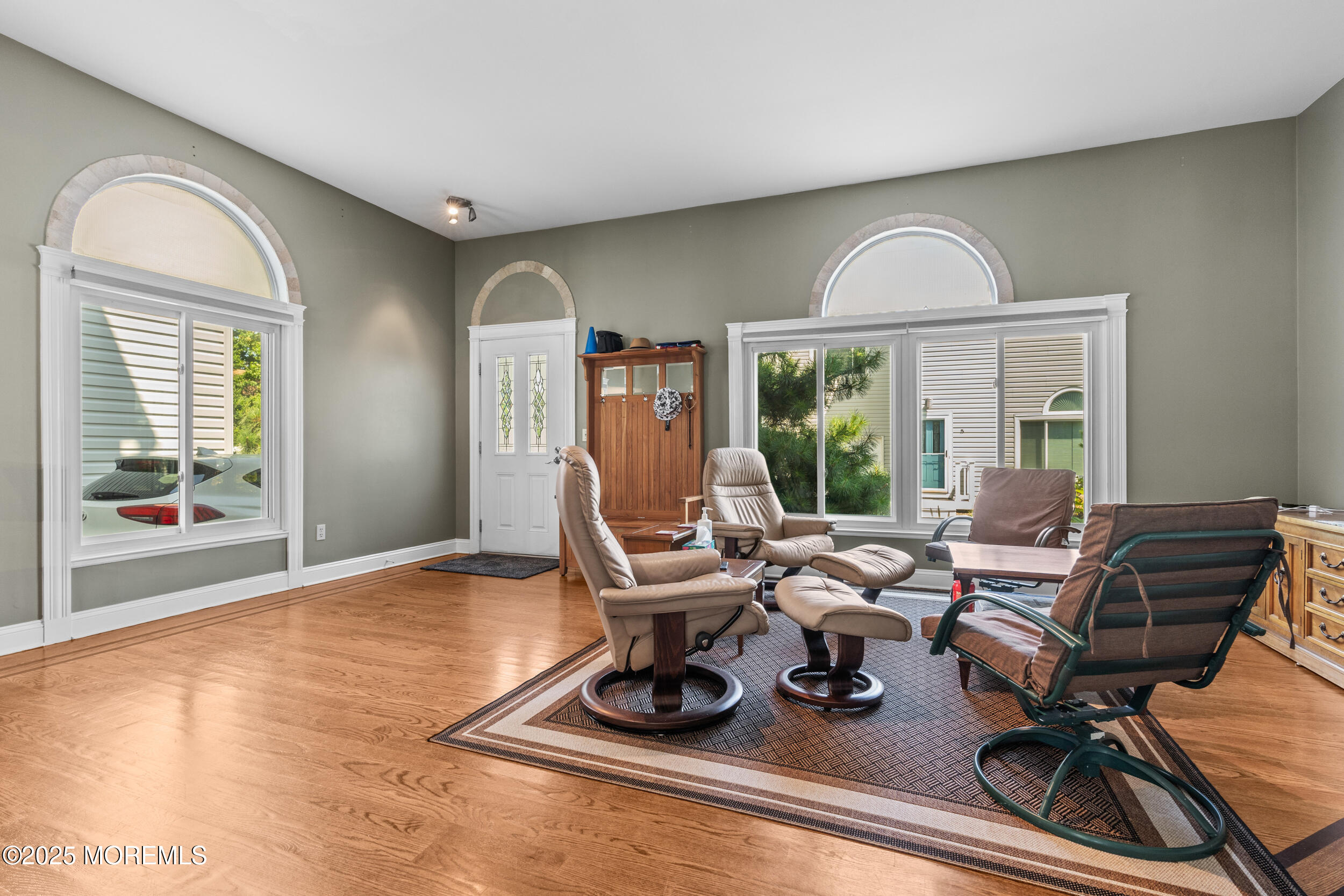 450 Ocean Boulevard, Unit 8 Long Branch, NJ 07740 - Photo 5 of 33 a view of a livingroom with furniture window and outside view
