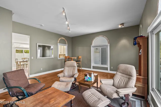 a living room with furniture or couch and a window