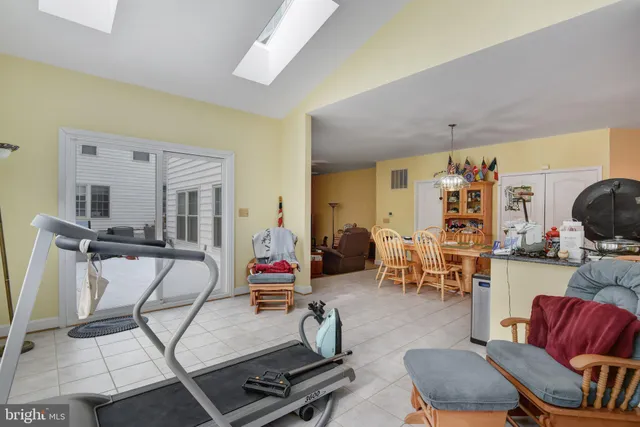 a view of house with backyard