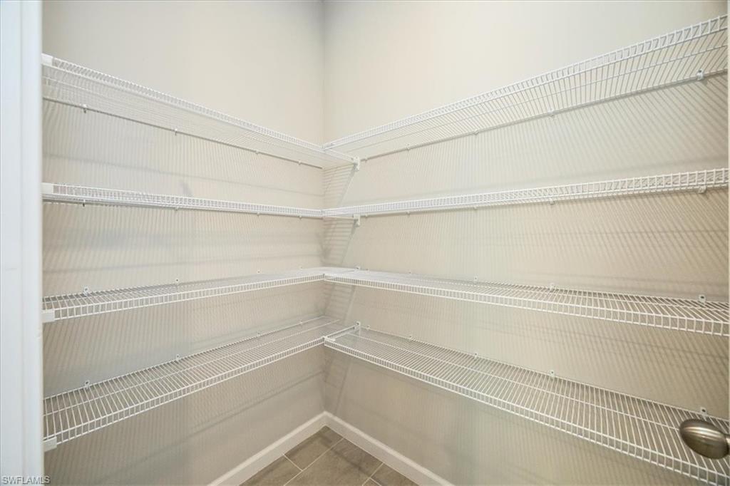 4687 Arboretum Circle, Unit 203 Naples, FL 34112 - Photo 15 of 24 a view of a closet