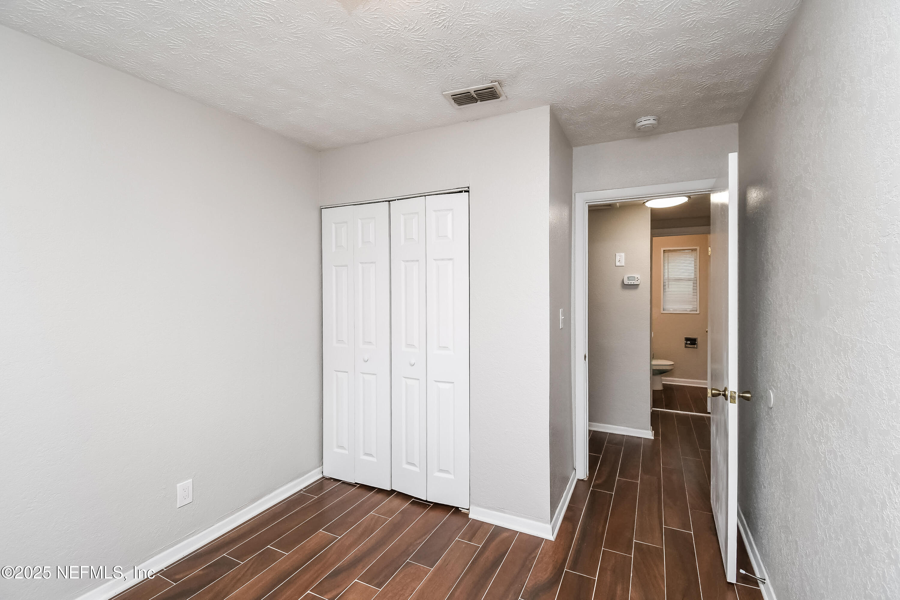 10429 Anders Boulevard Jacksonville, FL 32246 - Photo 11 of 15 wooden floor in a gallery