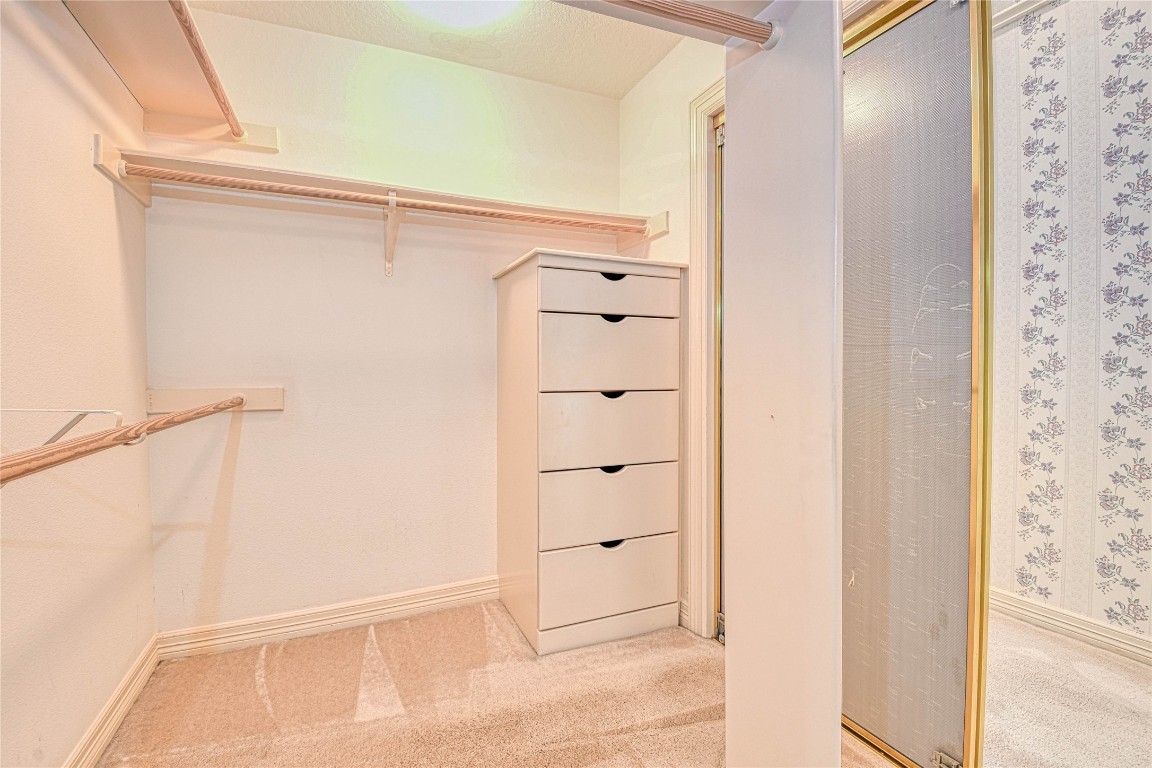 2 Woodmere Place Spring, TX 77381 - Photo 12 of 20 a view of walk in closet